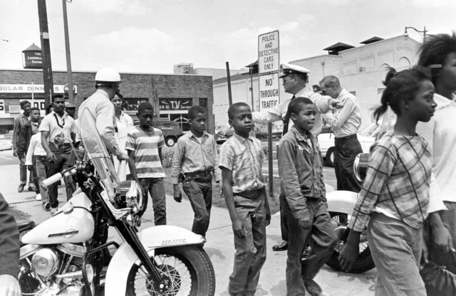 On This Day: The Children’s Crusade of 1963
📍 Birmingham, Alabama

On May 2, 1963, more than 1,000 Black students—some as young as six—walked out of their classrooms and into the streets of Birmingham. Trained in nonviolence and inspired by radio DJs who broadcast coded messages, these students marched to demand an end to segregation.

What followed became known as the Children’s Crusade—a pivotal moment in the Civil Rights Movement. Over several days, nearly 5,000 children were arrested. Commissioner Bull Connor ordered police to unleash fire hoses and attack dogs on the young marchers. The brutal images shocked the nation and the world.

This act of courage by the youngest foot soldiers forced national attention, helped shift public opinion, and ultimately pressured President Kennedy to endorse civil rights legislation—paving the way for the Civil Rights Act of 1964.

In a time when books are being banned and the truth of our history is being challenged, we remember: young people have always led movements for change.

This is the history that cannot be erased—and we exist to ensure it never will be.
March On! is committed to uplifting the untold and mis-told stories of the Civil Rights Movement—so every generation knows the power of truth, courage, and collective action.

Image Sources: HISTORY, NPR, and National Museum of African American History and Culture

#ChildrensCrusade #Birmingham1963 #YouthActivism #CivilRightsHistory #MarchOn #StoriesThatMove